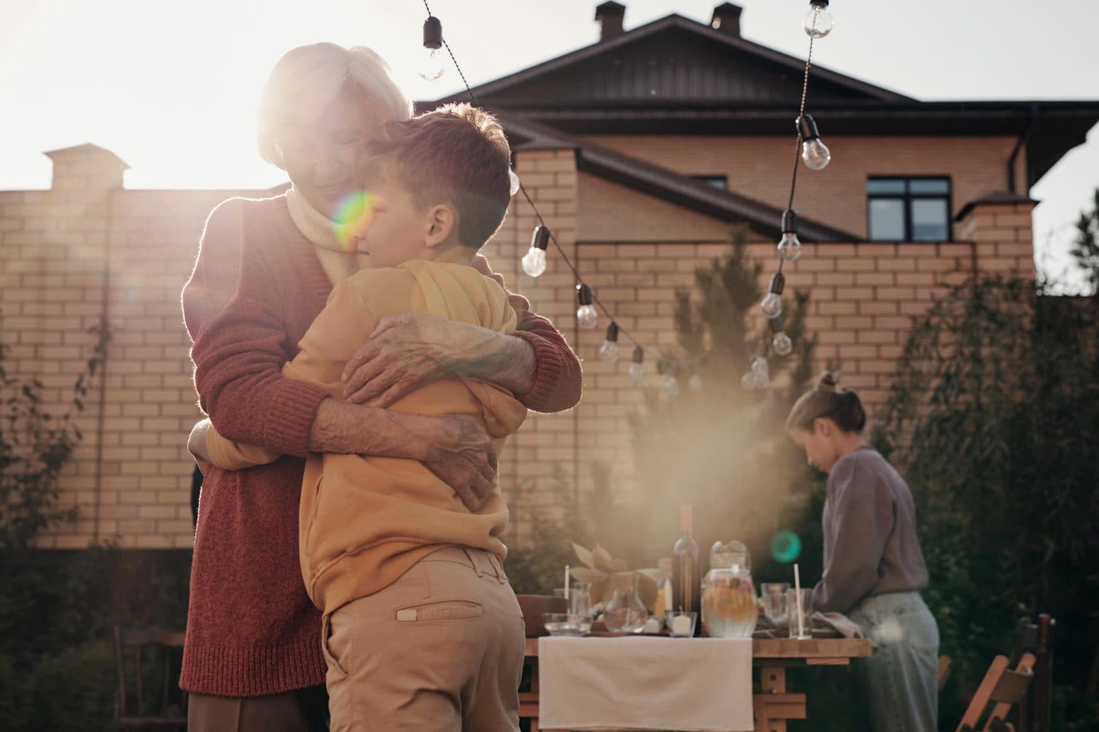 A family together in the garden of their home